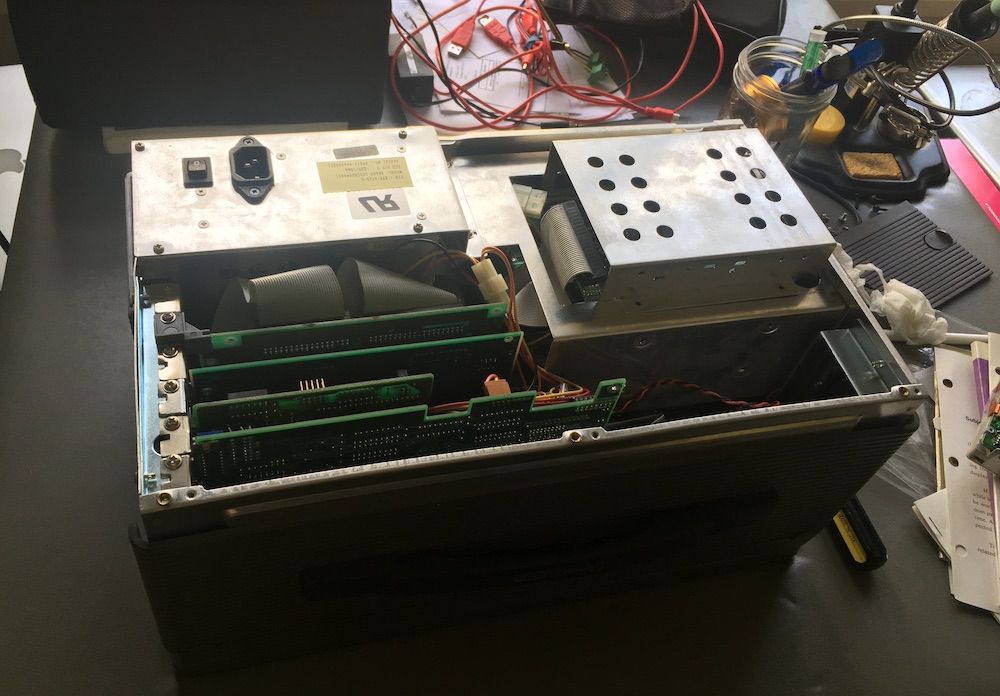 This is the computer before I took it apart. The 200W power supply is the big shiny box in the upper left. Not much room to work with. I’m glad that one still works—desktop ones are larger.